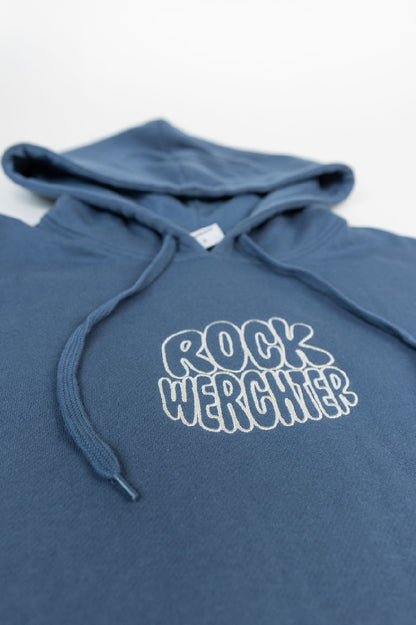 Blue hoodie with 'Rock Werchter' text on a white background