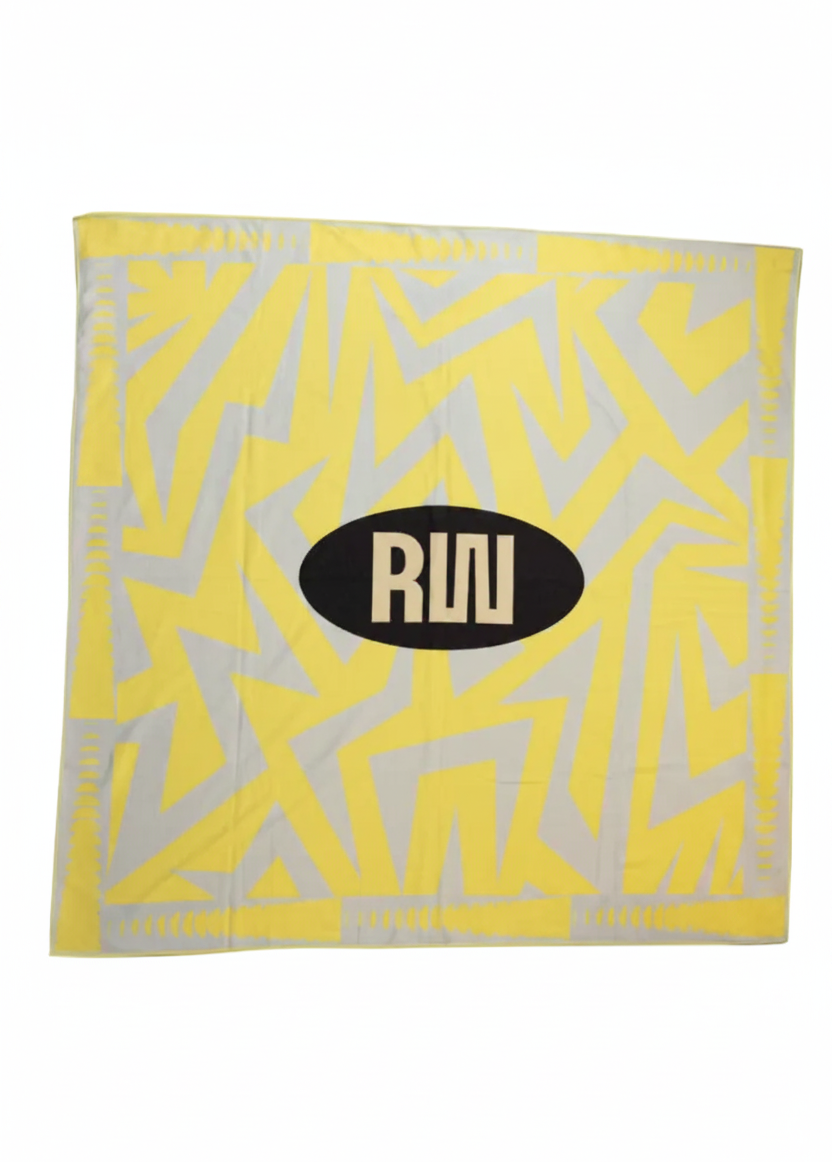 Yellow and gray patterned towel with a brand logo on a white background